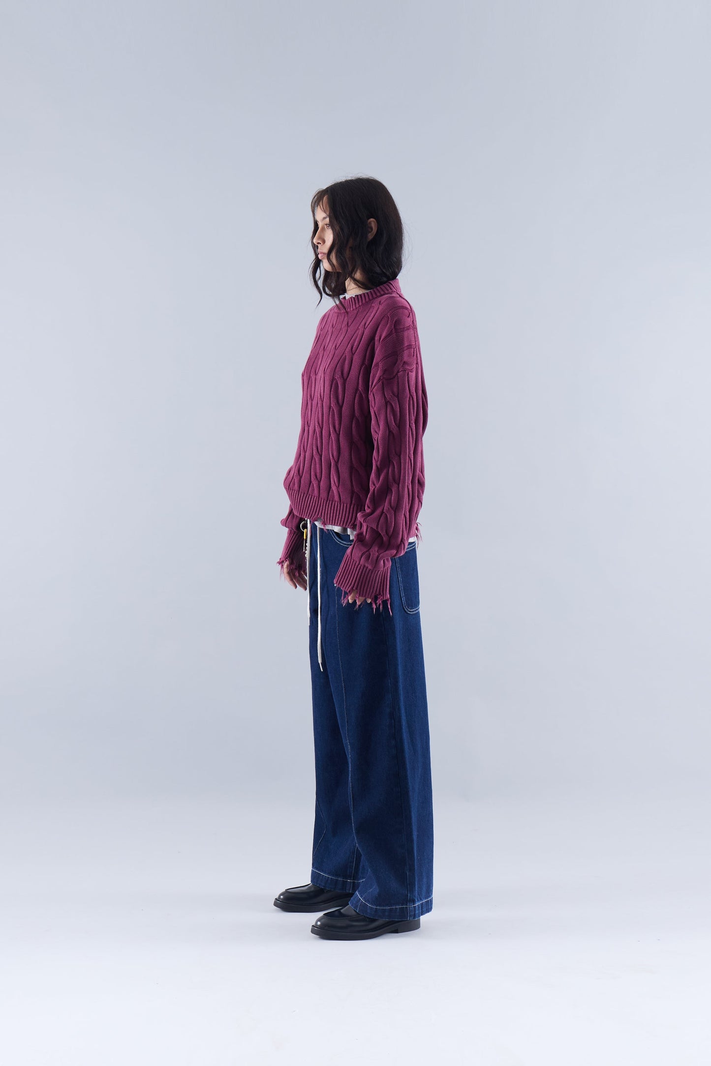 CABLE KNIT DISTRESSED SWEATER
